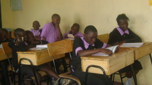 Catherine Awuoche and Betty Edendwa together with their classmates at Cana rescue centre