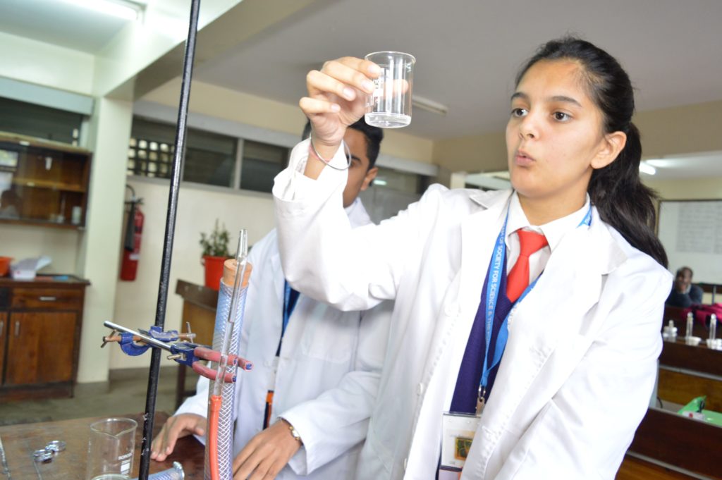 Mansi Apte showing crystall clear water after using the water purifying technology (2)